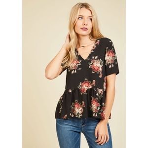 ModCloth Black and rose print peplum top